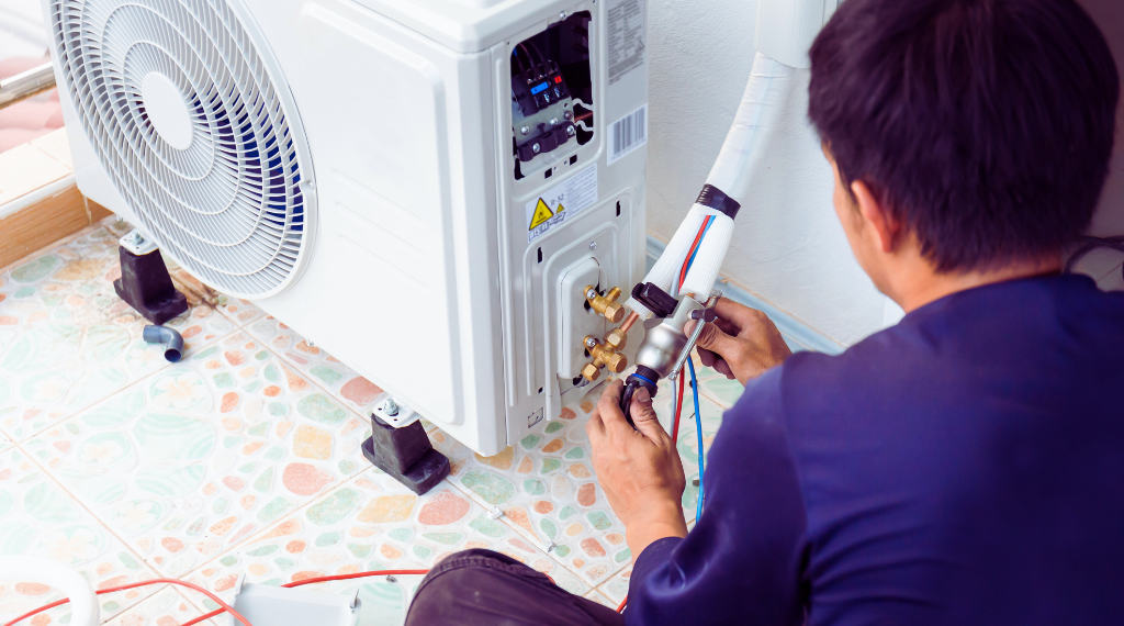 Technician working for AC maintenance